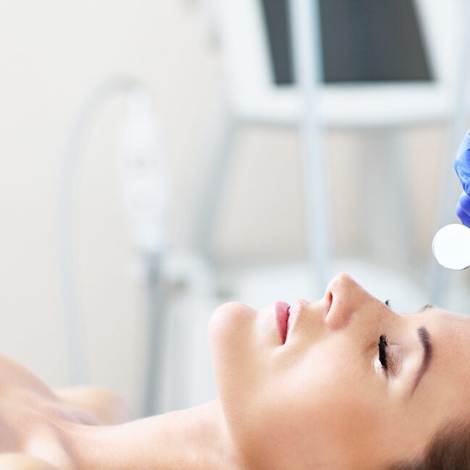 Picture of woman having facial treatment in beauty salon